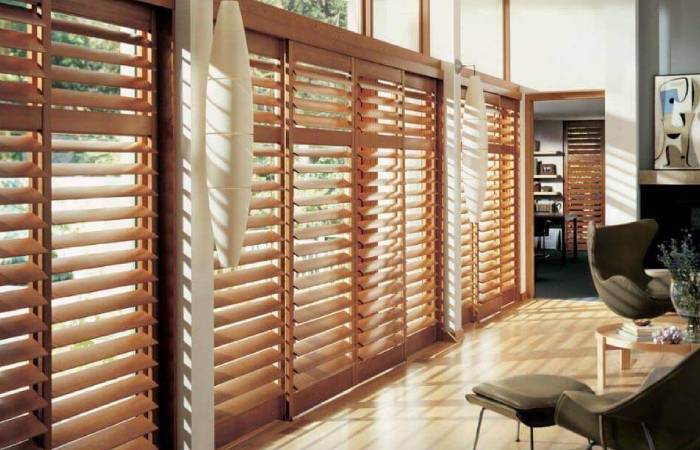 a photo of a brown wooden blinds from comfort blinds