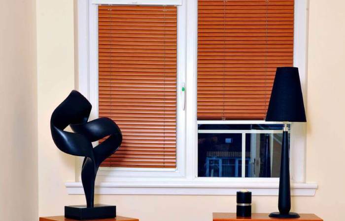 photo of a wooden blind in a room from comfort blinds